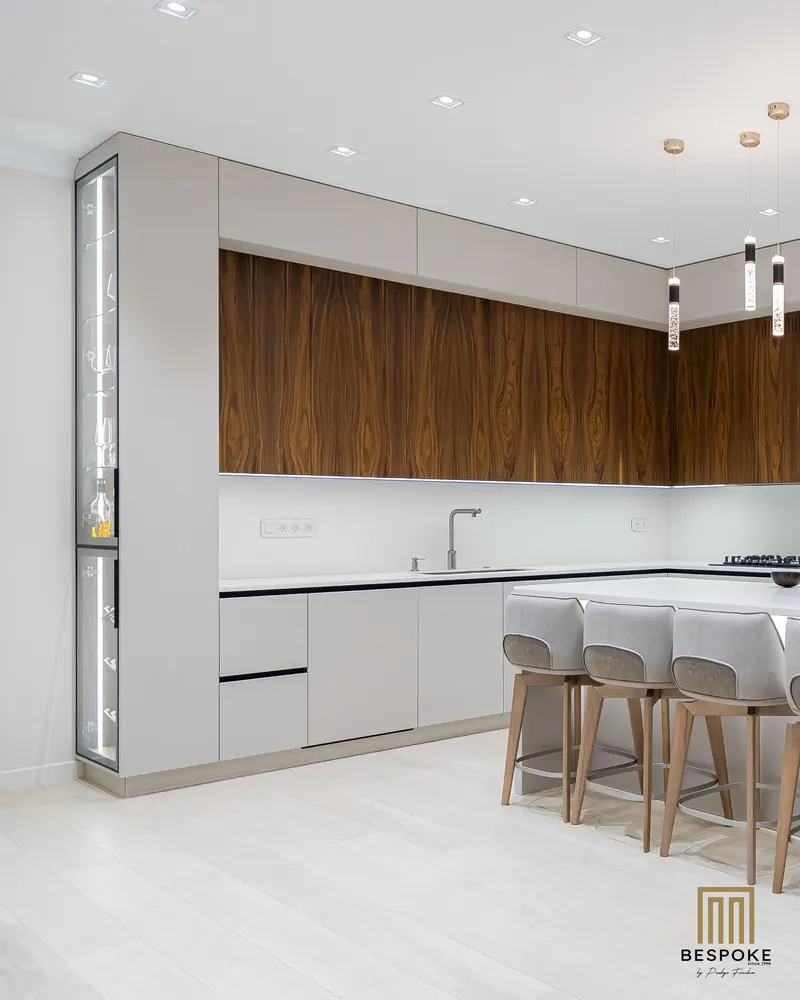 Walnut and light grey handle-less kitchen with island